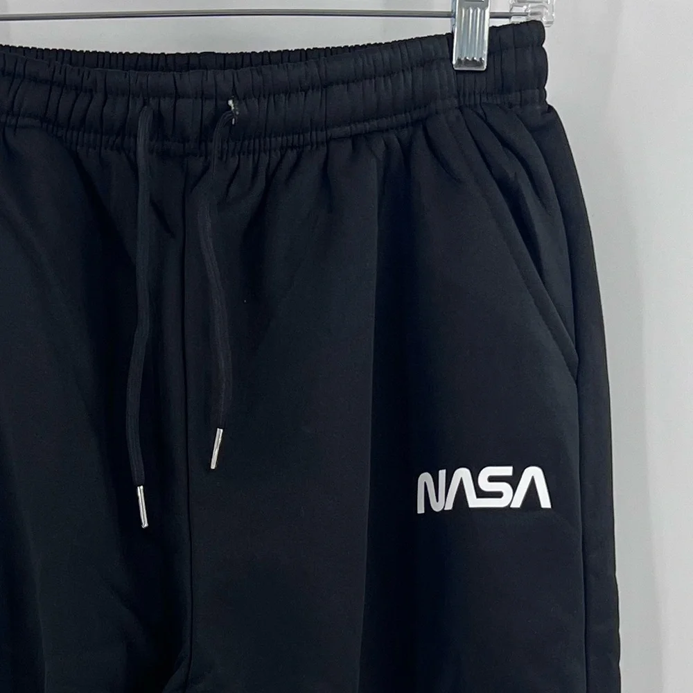 SHEIN MEN’s NASA joggers are fleece-lined. Medium